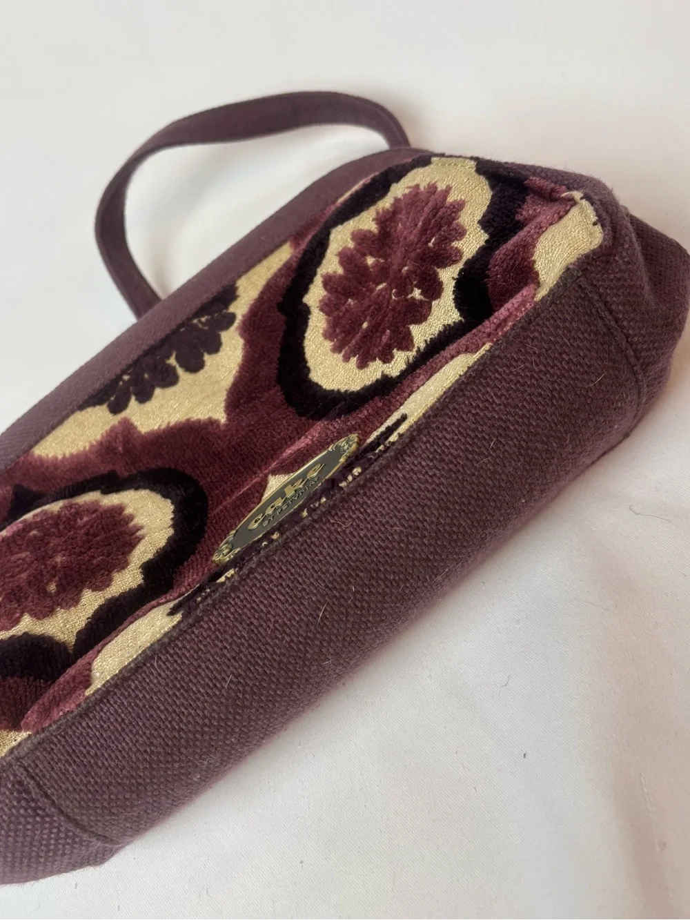 Petunia Pickle Bottom Cake Cameo Clutch Diaper Bag Plum Cream Damask Jacquard